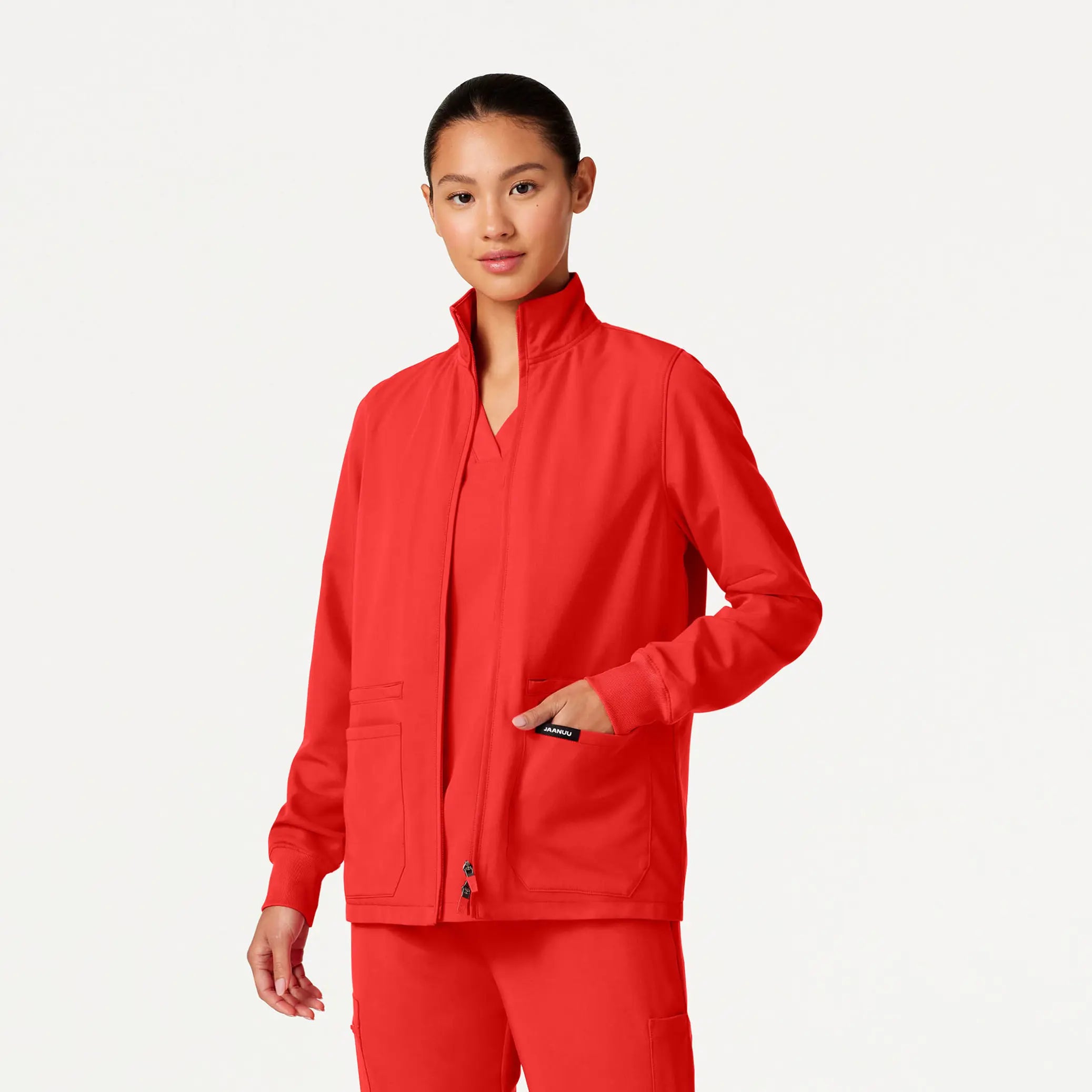 Jaanuu Women's Ceri Essential 6-Pocket Scrub Jacket - Solar RedThermal Jackets